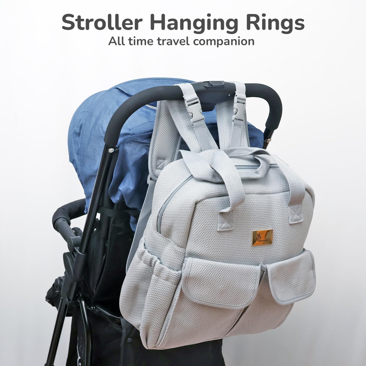 Gray backpack with stroller hanging rings on a white background